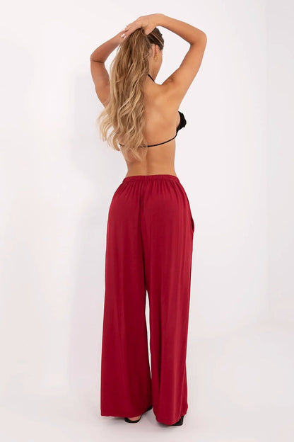 Italy Moda Women's High-Waisted Palazzo Trousers displayed in a modern setting, highlighting the wide-leg style perfect for summer fashion.