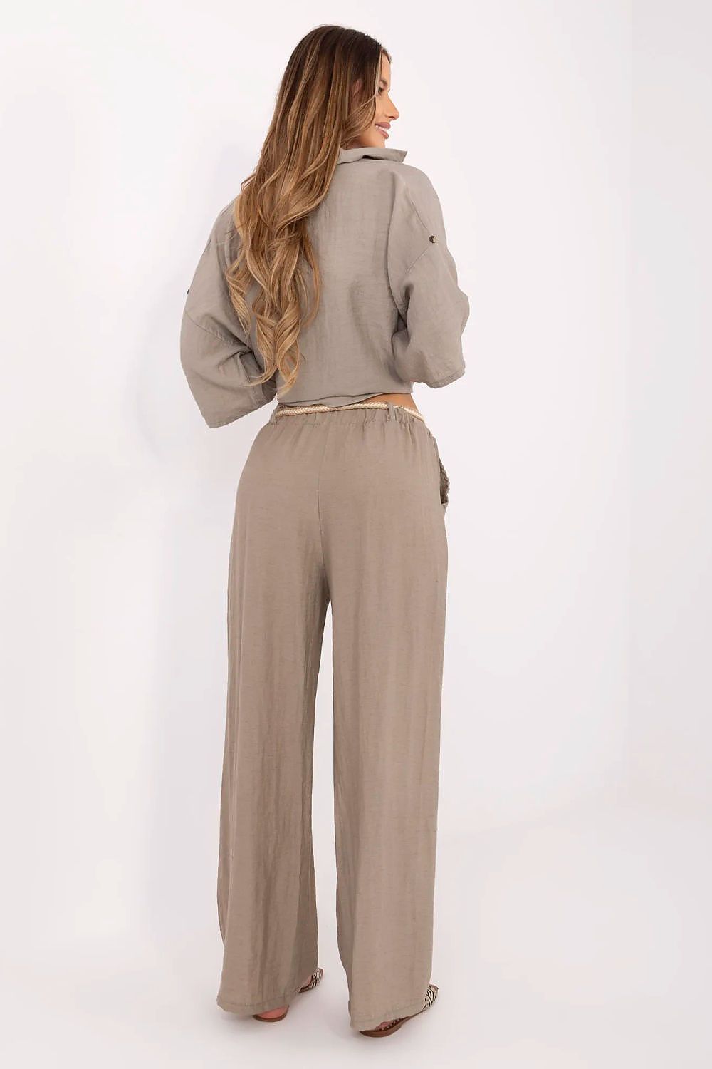 Italy Moda Women's Boho Trousers displayed with side slip pockets, illustrating functionality and fashion in a chic summer ensemble.