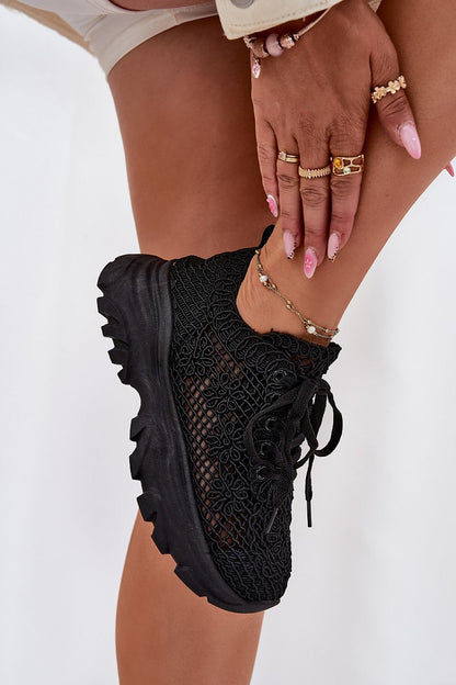 Step in style women's fashionable sneakers showcasing a thick sole and trendy crocheted design, ideal for casual everyday wear.