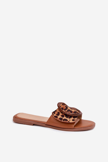 Chic flat-heeled women's suede sandals featuring intricate braided straps and a stylish buckle, designed by Step in style for summer fashion.