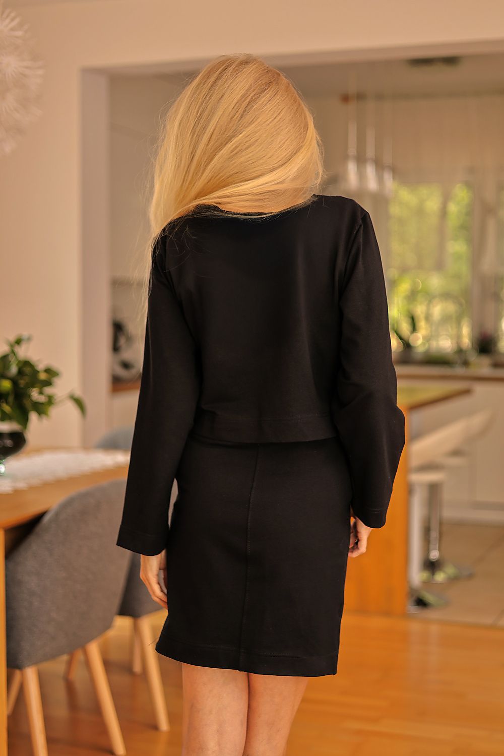 Elegant Mirale sporty dress and oversized hoodie set in luxurious cotton knit, showcasing a flattering V-neck design.