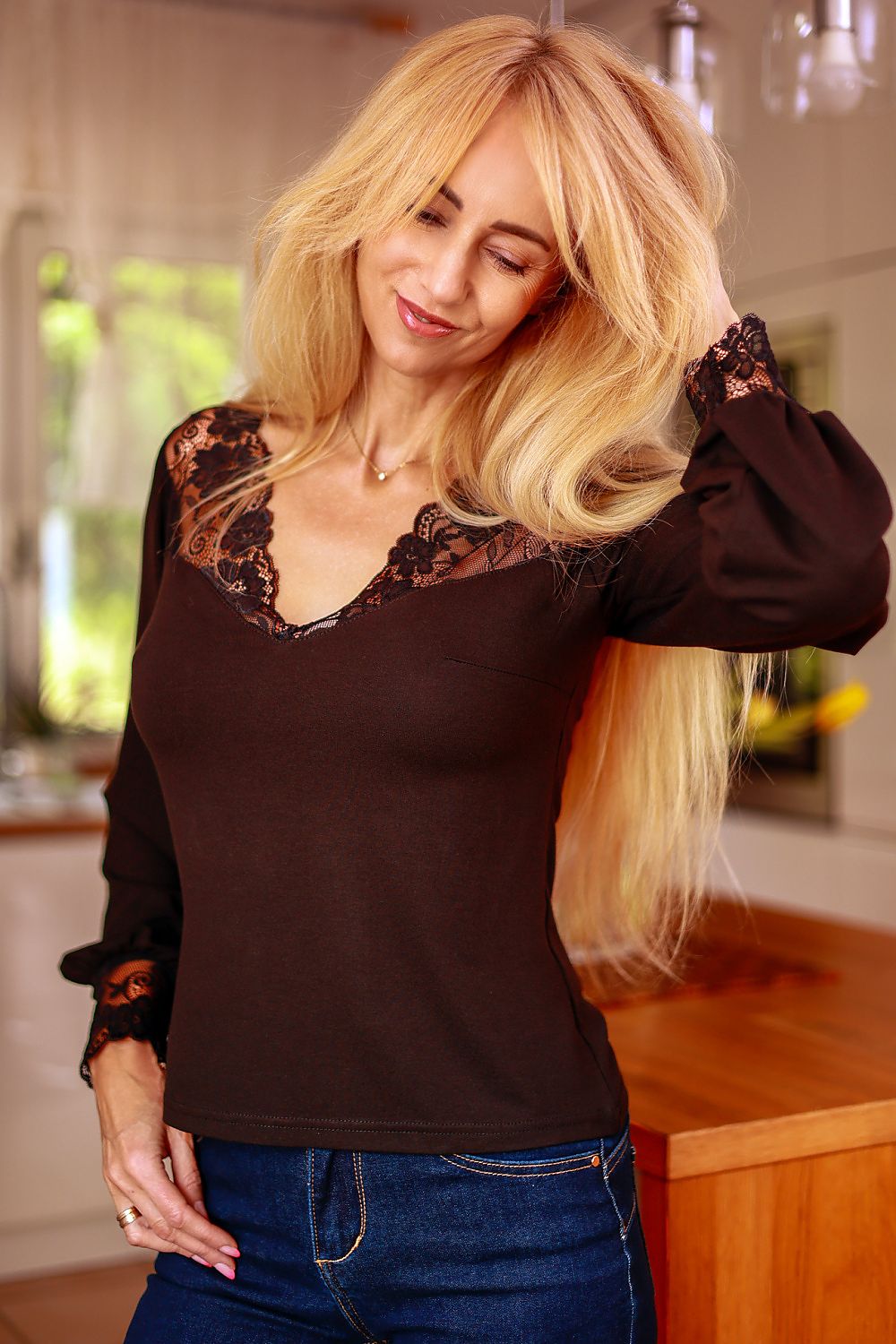 Elegant Mirale Laila Floral Lace Blouse made of breathable viscose, showcasing an ornamental neckline and delicate lace cuffs, available in sizes S to XXL.