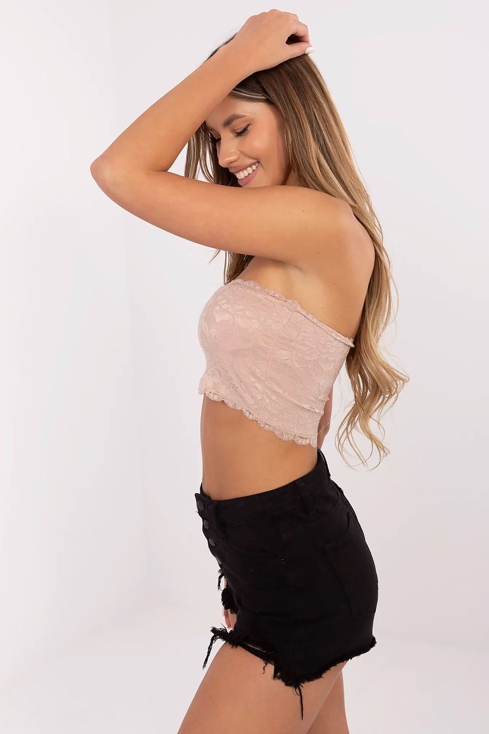 Sublevel's stylish lace top featuring a breathable blend, ideal for chic casual outfits, beautifully emphasising the contemporary rectangular neckline.