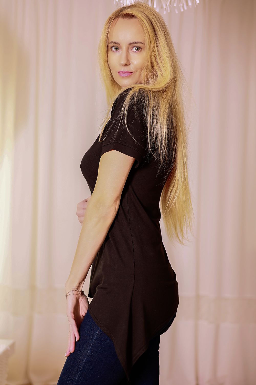 Luxurious Mirale Classic V-Neck Blouse, exhibiting its flattering V-neck design, made for modern elegance.