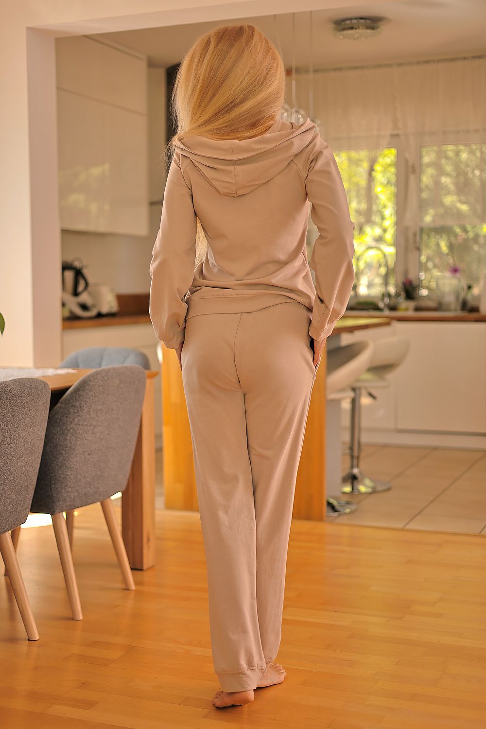 Mirale women's Brav lounge pants, designed for ultimate comfort with zippered pockets and cuffed legs, perfect for sporty elegance.