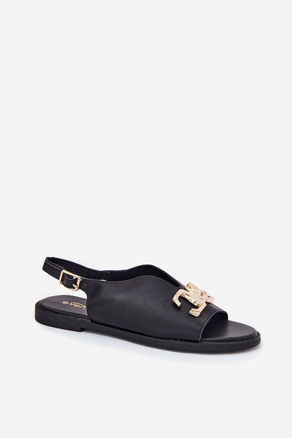 Close-up of Step in Style luxury eco-leather women's sandals featuring gold decoration and comfortable flat-heeled sole, ideal for summer elegance.