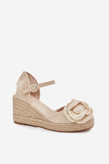 Luxury women's wedge sandals from Step in Style, showcasing a chic crocheted flower accent and comfortable design for all-day wear.