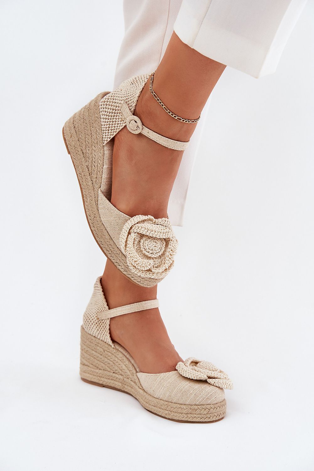 Step in Style elegant women's wedge sandals with braided detailing, adding a touch of sophistication to your summer wardrobe.