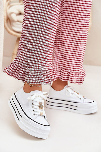 Elegant women's fashion sneakers with a modern design by Step in style, showcasing gold detailing and a robust 4.5cm platform height.