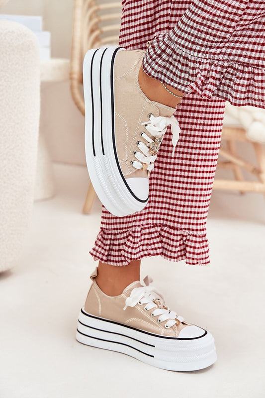 Elegant women's platform canvas sneakers with gold accents, designed by Step in Style, showcasing a chic and modern look perfect for stylish comfort.