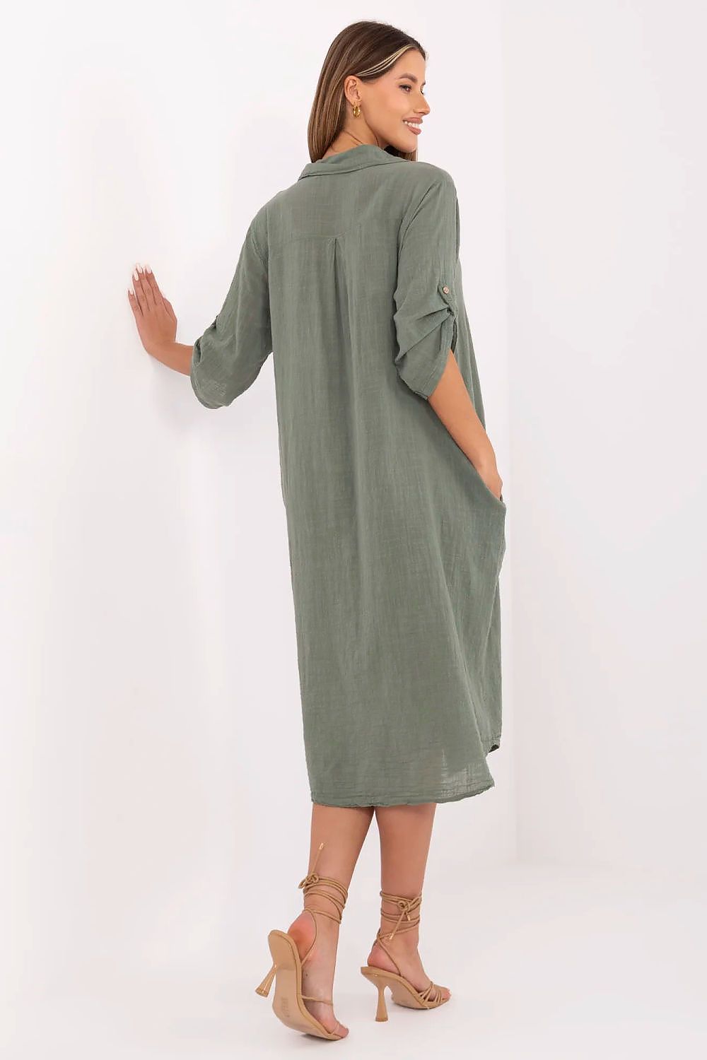 Elegant Och Bella oversized shirt dress featuring a breathable cotton fabric, classic collar design, and versatile 3/4 sleeves.