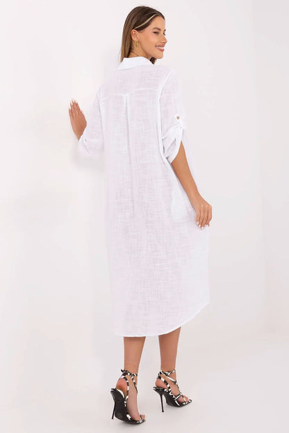 Chic Och Bella oversized cotton dress, crafted for effortless luxury with its smooth material and functional pockets.