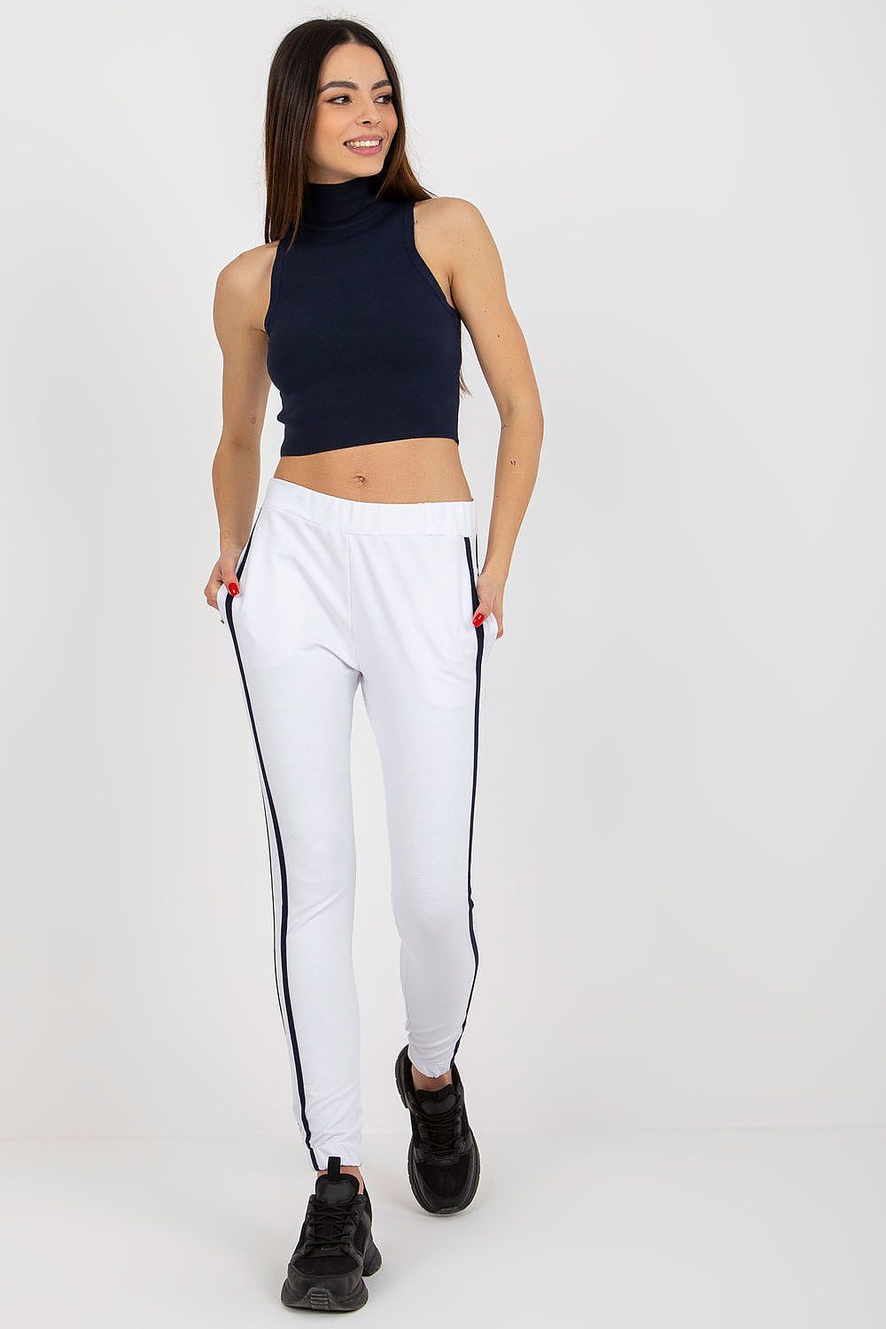 Luxury Rue Paris High-Waisted Tracksuit Trousers in a stylish cotton-blend equipped with pockets for everyday elegance.