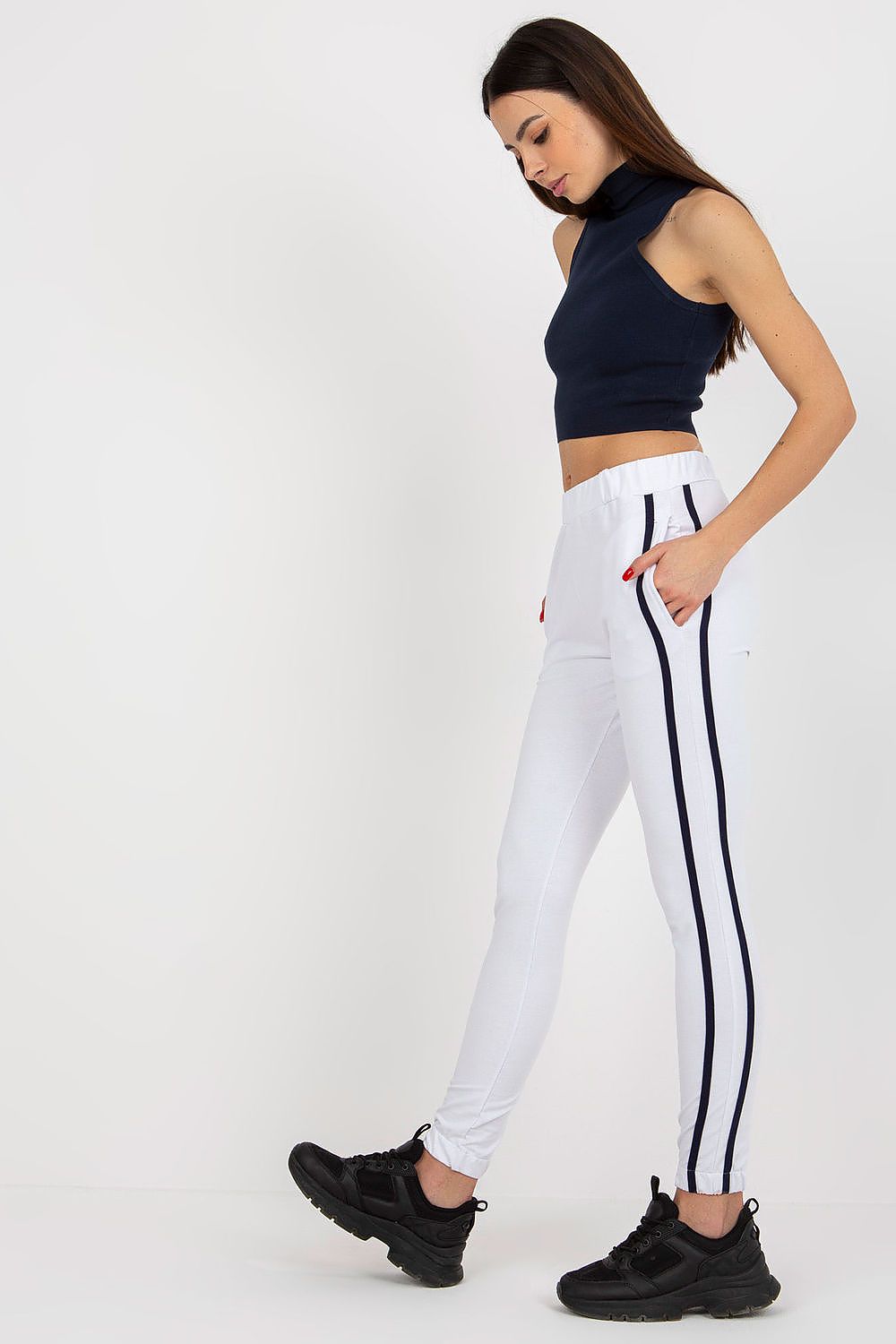 Close-up detail of Rue Paris High-Waisted Tracksuit Trousers showcasing the soft fabric and modern sporty design with contrasting stripes.