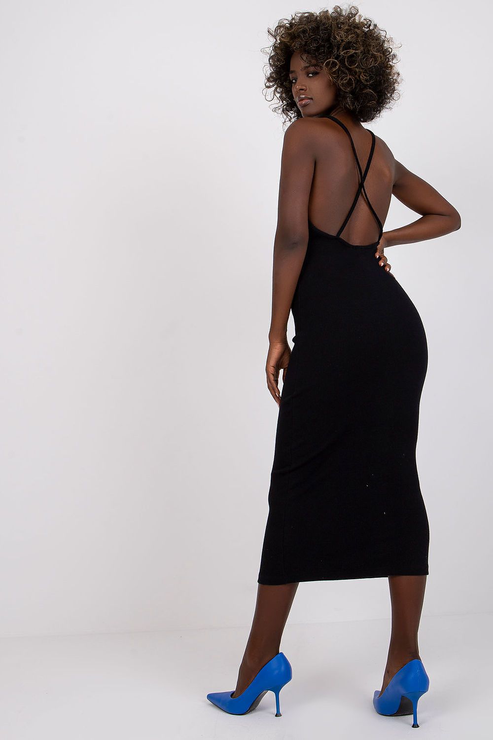 Full-length view of the Elegant Midi Daydress by Rue Paris, styled with sneakers and a denim jacket for a sophisticated summer outfit.