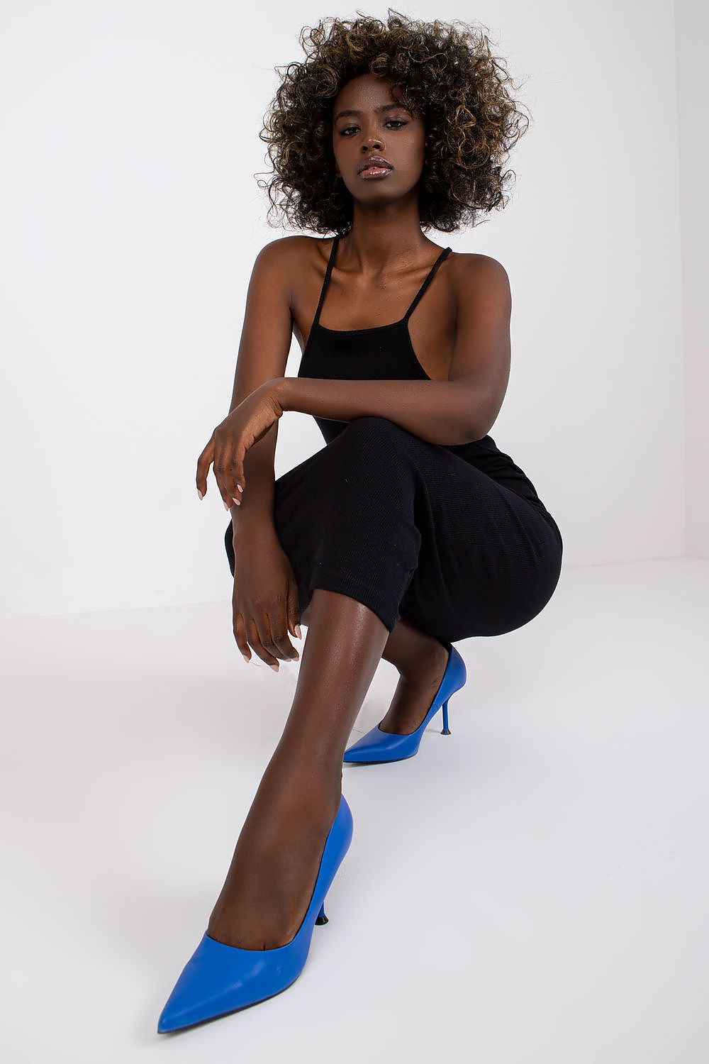 Detail of the ribbed cotton fabric of the Elegant Midi Daydress by Rue Paris, emphasizing comfort and luxury for casual summer days.