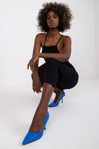 Detail of the ribbed cotton fabric of the Elegant Midi Daydress by Rue Paris, emphasizing comfort and luxury for casual summer days.