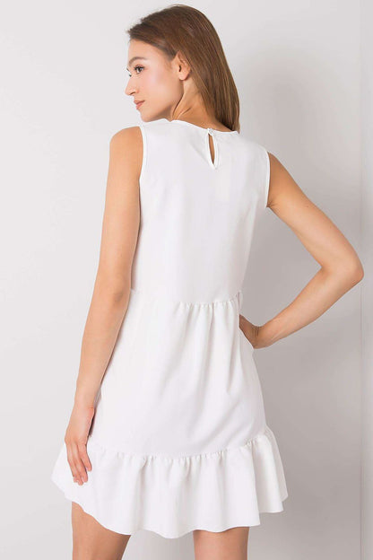 Elegant sleeveless mini daydress by Rue Paris, featuring a romantic ruffle detail and a smooth fabric finish, perfect for summer occasions.