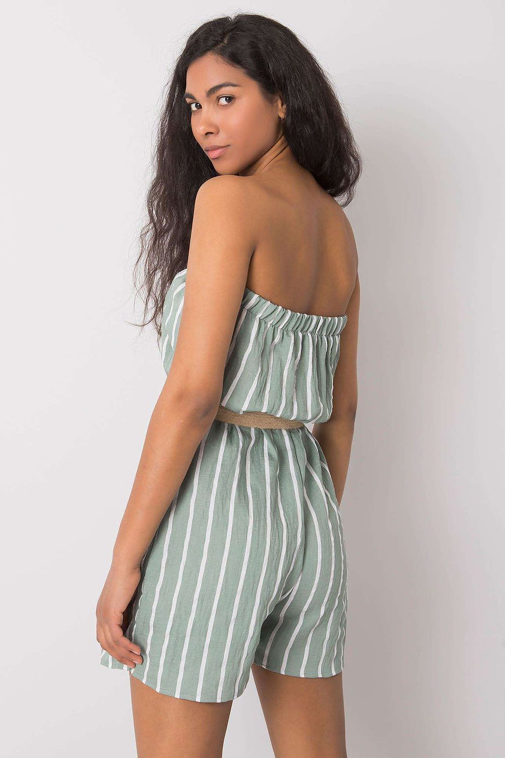 Chic model wearing Rue Paris stylish striped jumpsuit with a flattering silhouette, ideal for casual outings and gatherings.