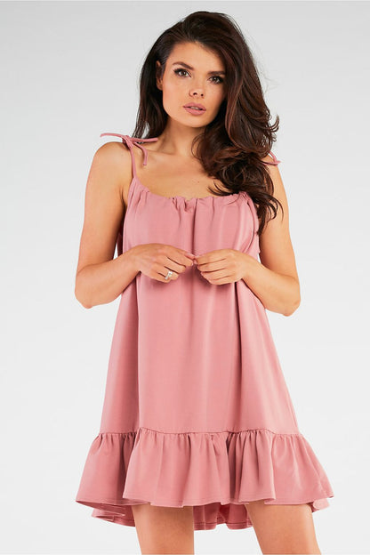 Elegant Infinite You Summer Dress in soft knitwear featuring a chic A-line silhouette and frill detail, ideal for adding a touch of luxury to maternity wear.