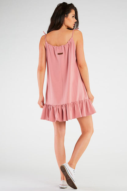 Luxury Infinite You summer dress in soft A-line knitwear with frill detail, ideal for pregnancy, showcasing elegance and comfort.