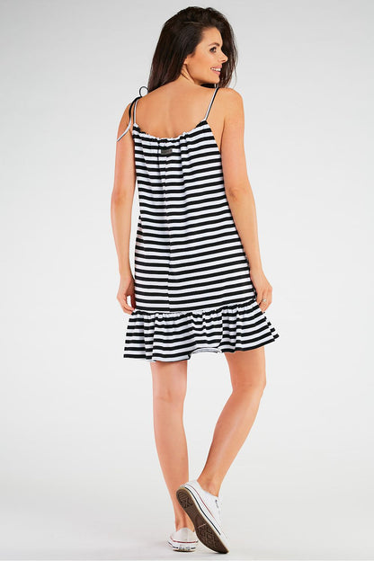 Close-up of Infinite You summer dress fabric showcasing luxurious knit texture ideal for maternity wear.