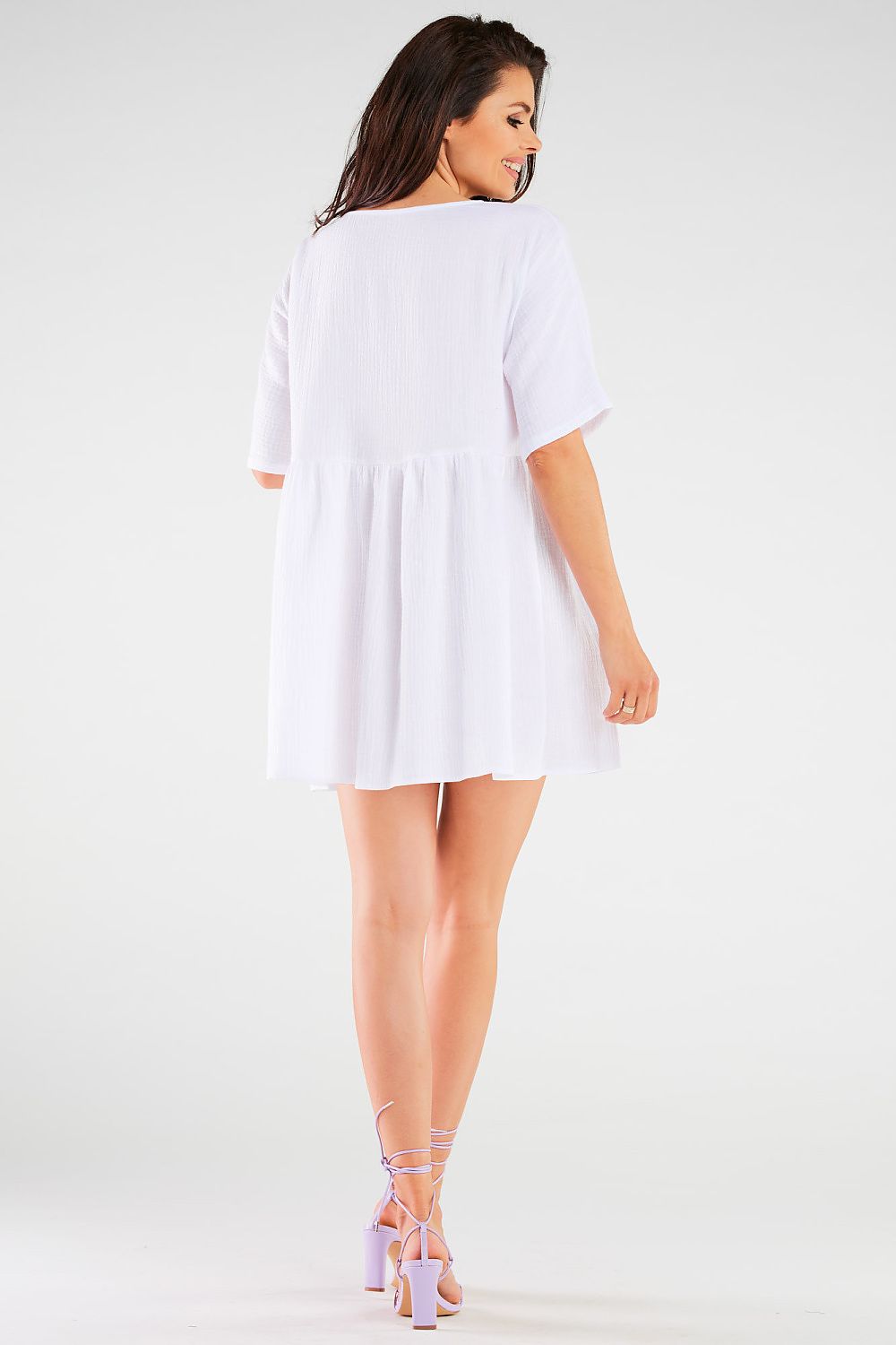 Model wearing the Elegant Casual Daydress by Infinite You, styled for effortless elegance in casual occasions, available in multiple sizes.