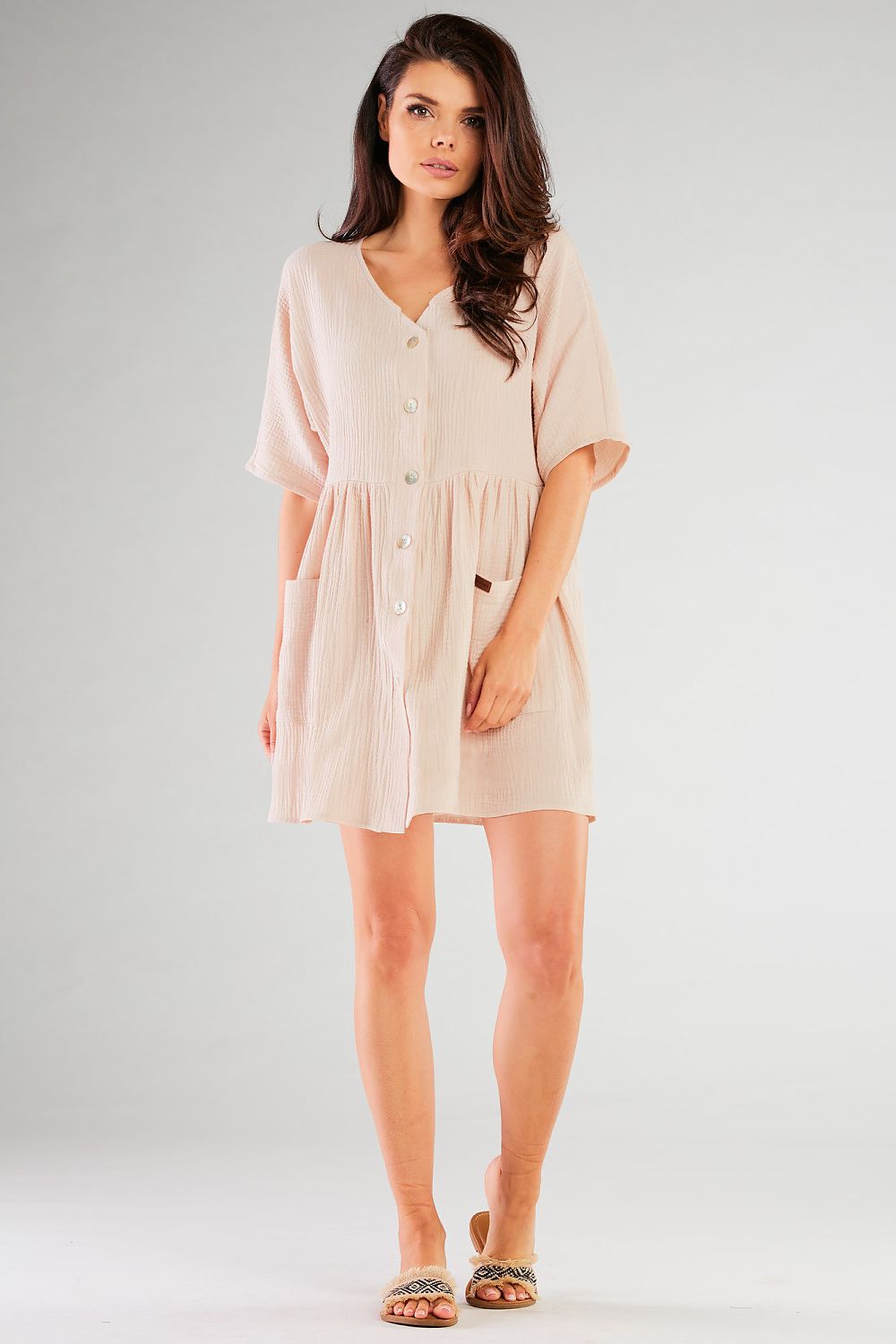 Model wearing an Infinite You casual shirt-style daydress, illustrating the flattering fit for sizes S/M and L/XL, ideal for stylish everyday elegance.