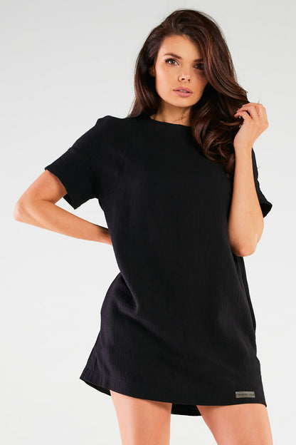 Elegant Infinite You Loose Mini Dress featuring a relaxed fit, crafted from soft comfortable knitwear, perfect for any occasion.