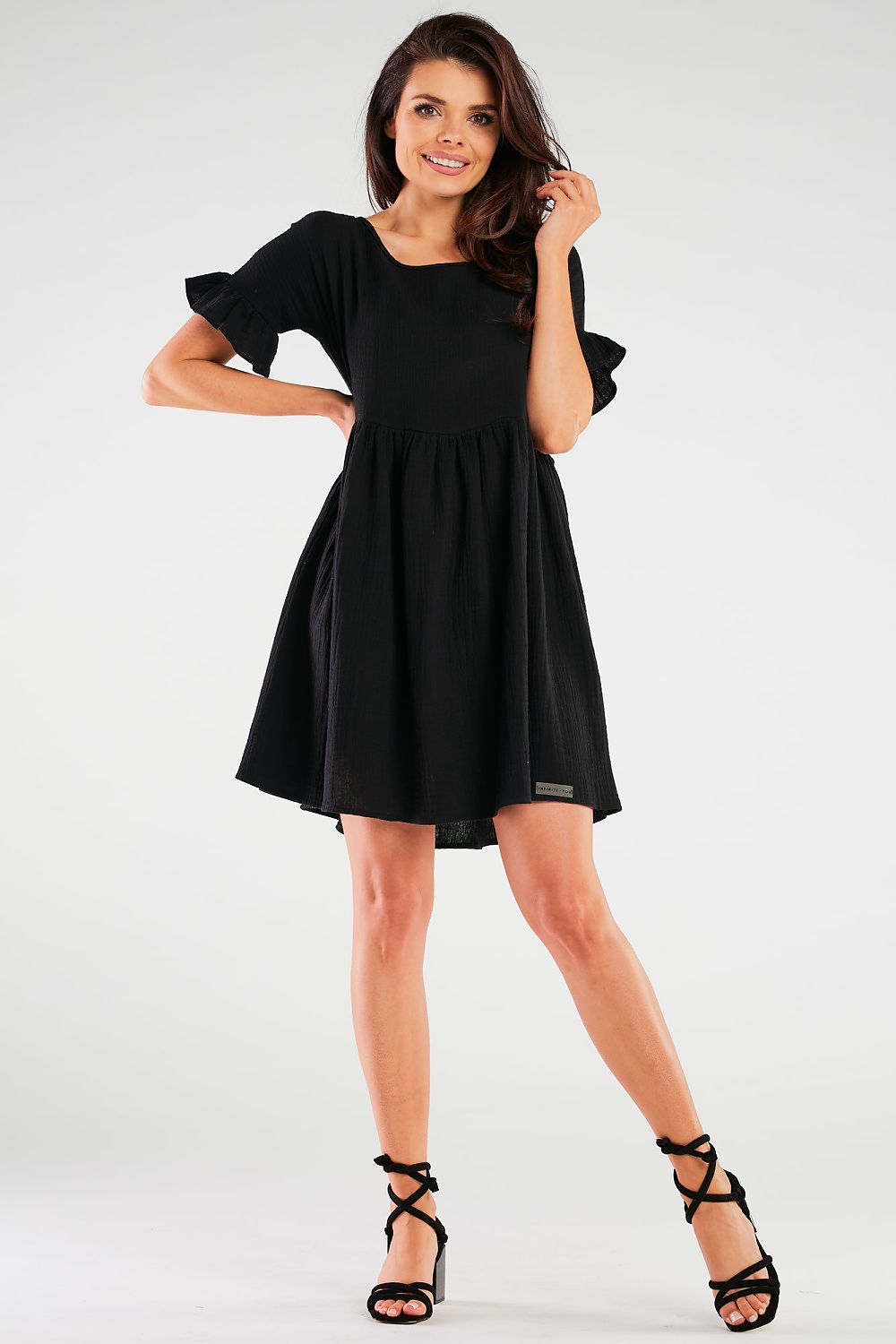 Detailed view of the flared hem of the Infinite You Luxury Cotton Blend Daydress, ideal for a stylish spring-summer outing.