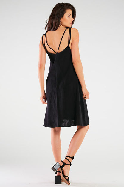 A model elegantly wearing the Luxury Infinite You Daydress, demonstrating its stylish fit for sizes S/M and L/XL.