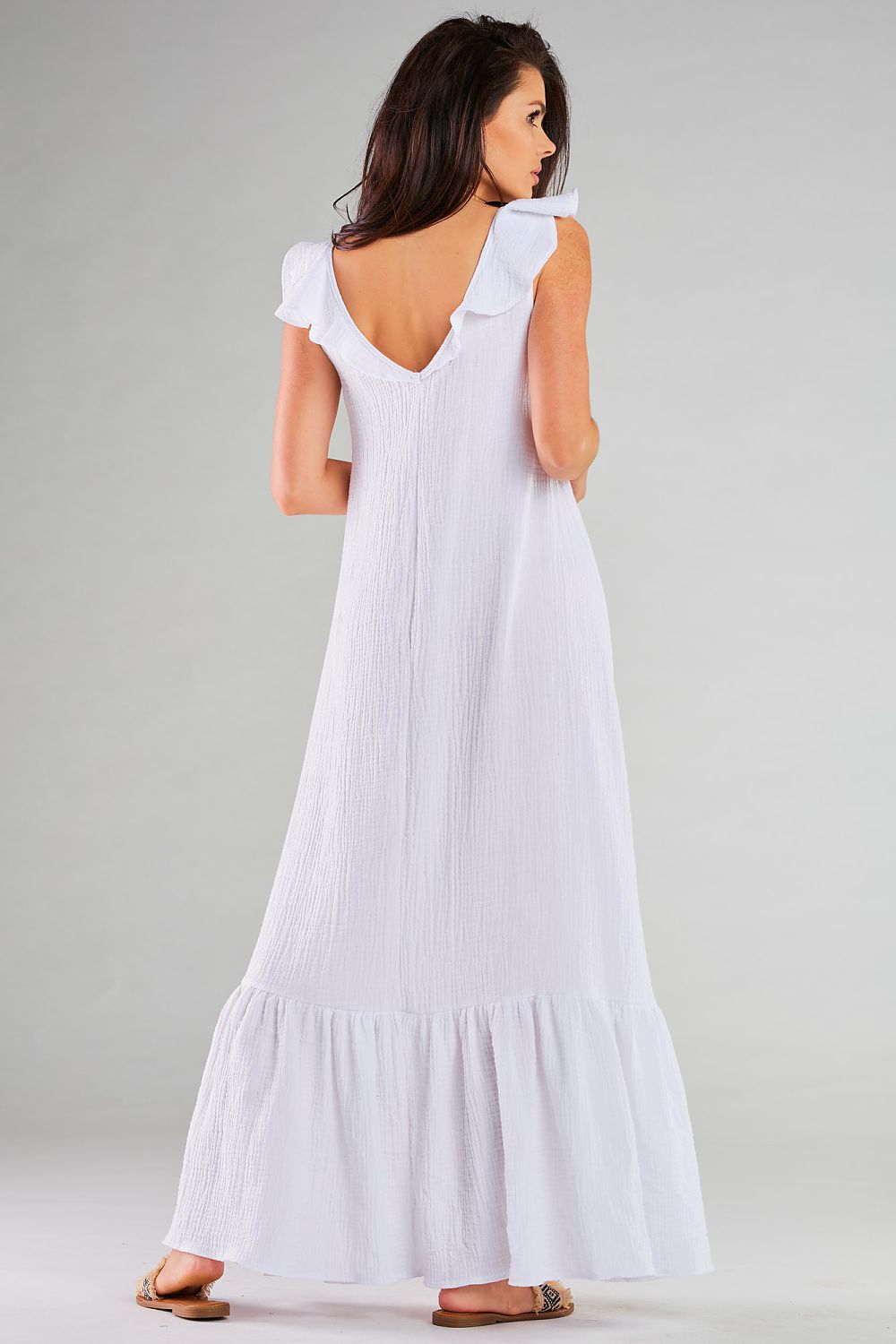 Luxurious Infinite You Long Dress displayed on a model, highlighting its size options S/M and L/XL, crafted in Poland for style and comfort.