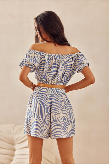 Lifestyle shot of women wearing Ilaria Animal Print Shorts by Roco Fashion, embodying style and comfort for summer leisure activities.