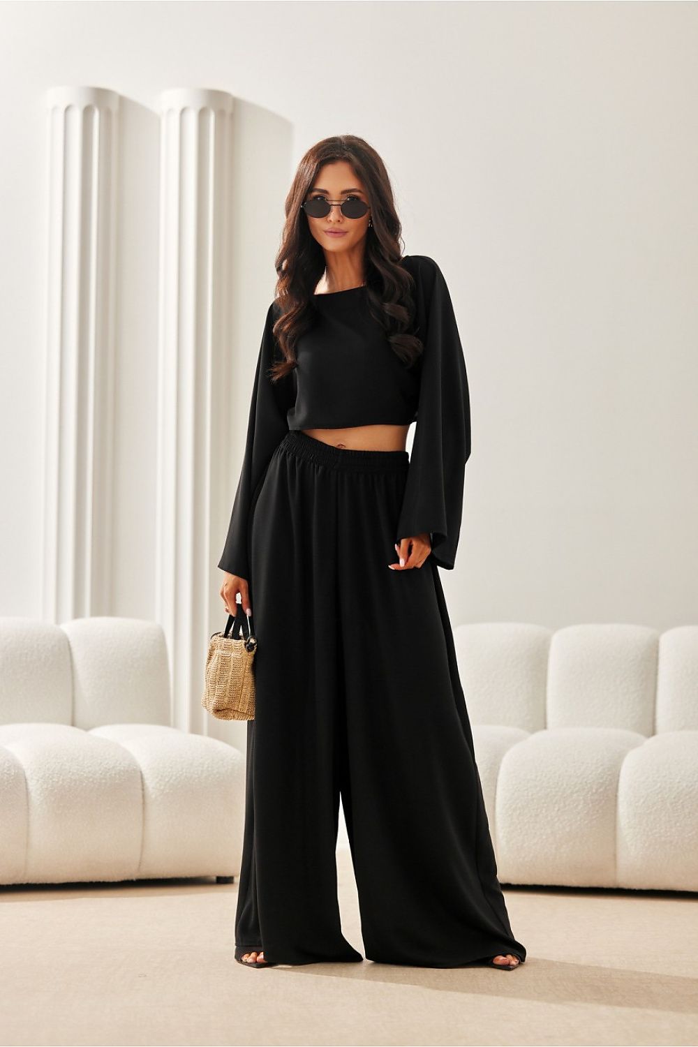 Lara Wide Leg Trousers for Women by Roco Fashion, showcasing stylish summer attire with a relaxed fit and airy material, perfect for elegant summer outings.
