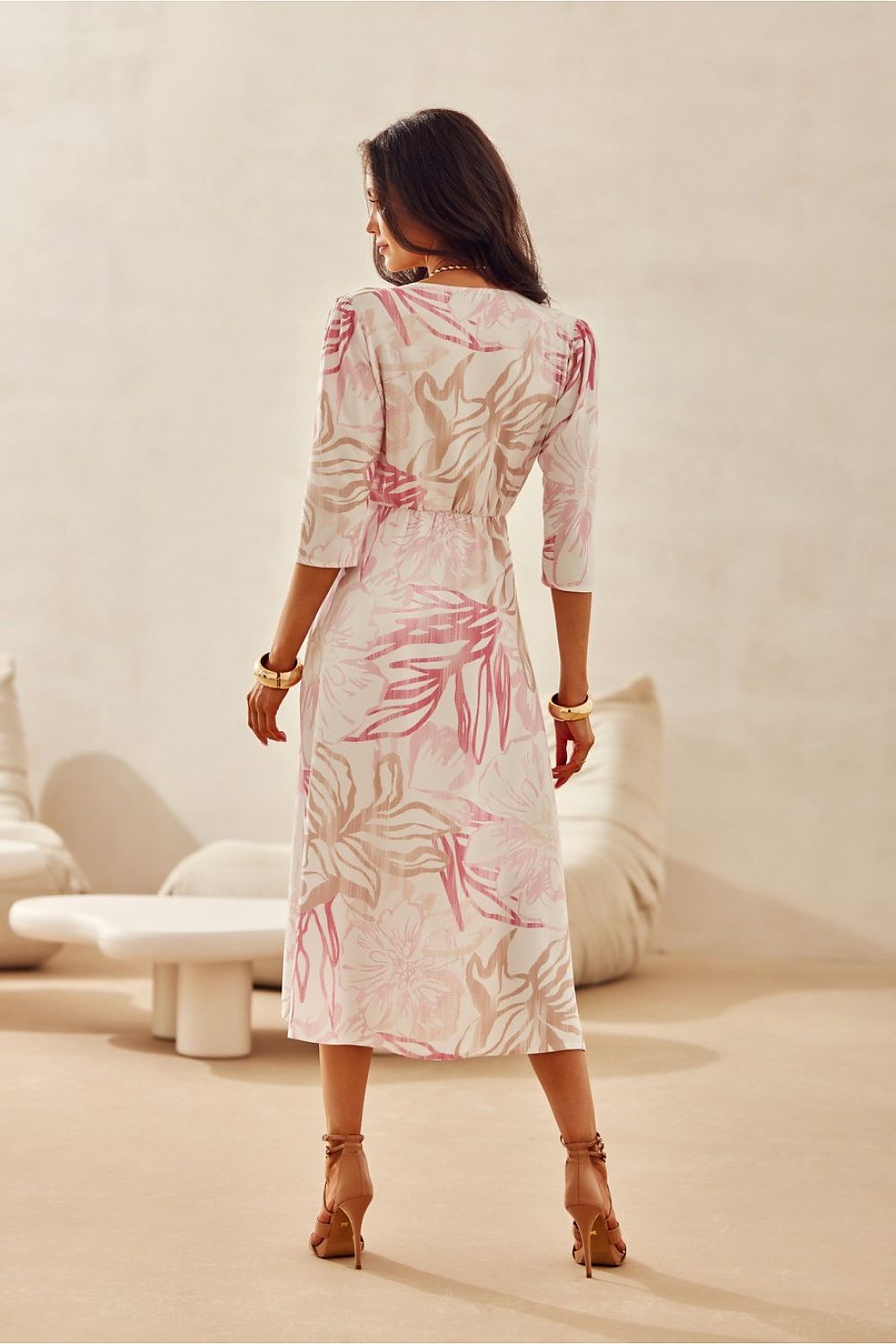 Back view of the Mirella Midi Dress by Roco Fashion with a tailored fit and adjustable waist tie for a flattering shape.