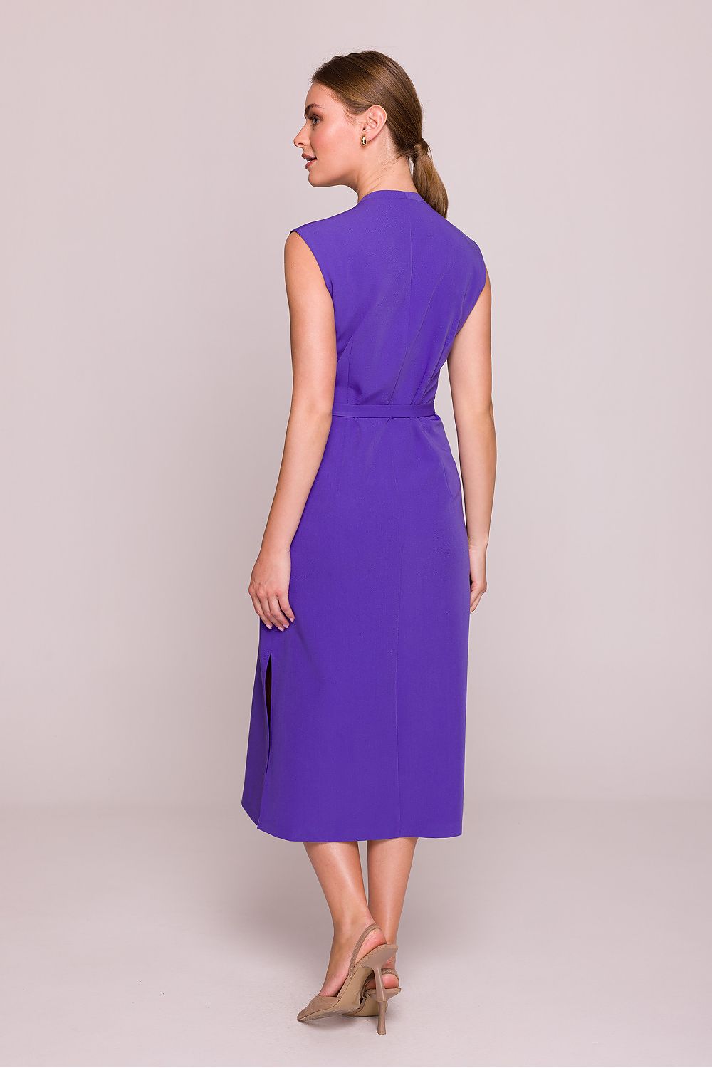 Stylove elegant midi daydress displayed on a mannequin, featuring a refined satin finish and adjustable tie detail at the V-neck.