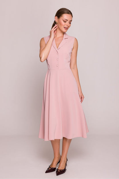 Stylove midi cocktail dress with functional side pockets, embodying modern elegance with a comfortable fit, ideal for elegant dinners.