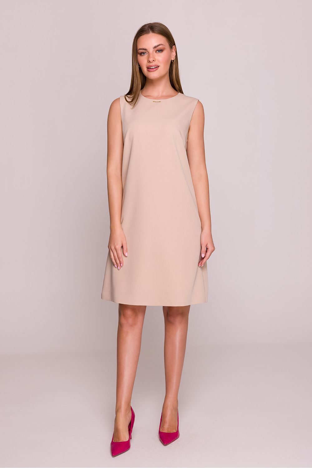 Stylove Elegant Satin Finish Daydress in luxurious satin fabric with trapezoidal cut, showcasing a round neckline and sleeveless design, perfect for office wear or casual outings.