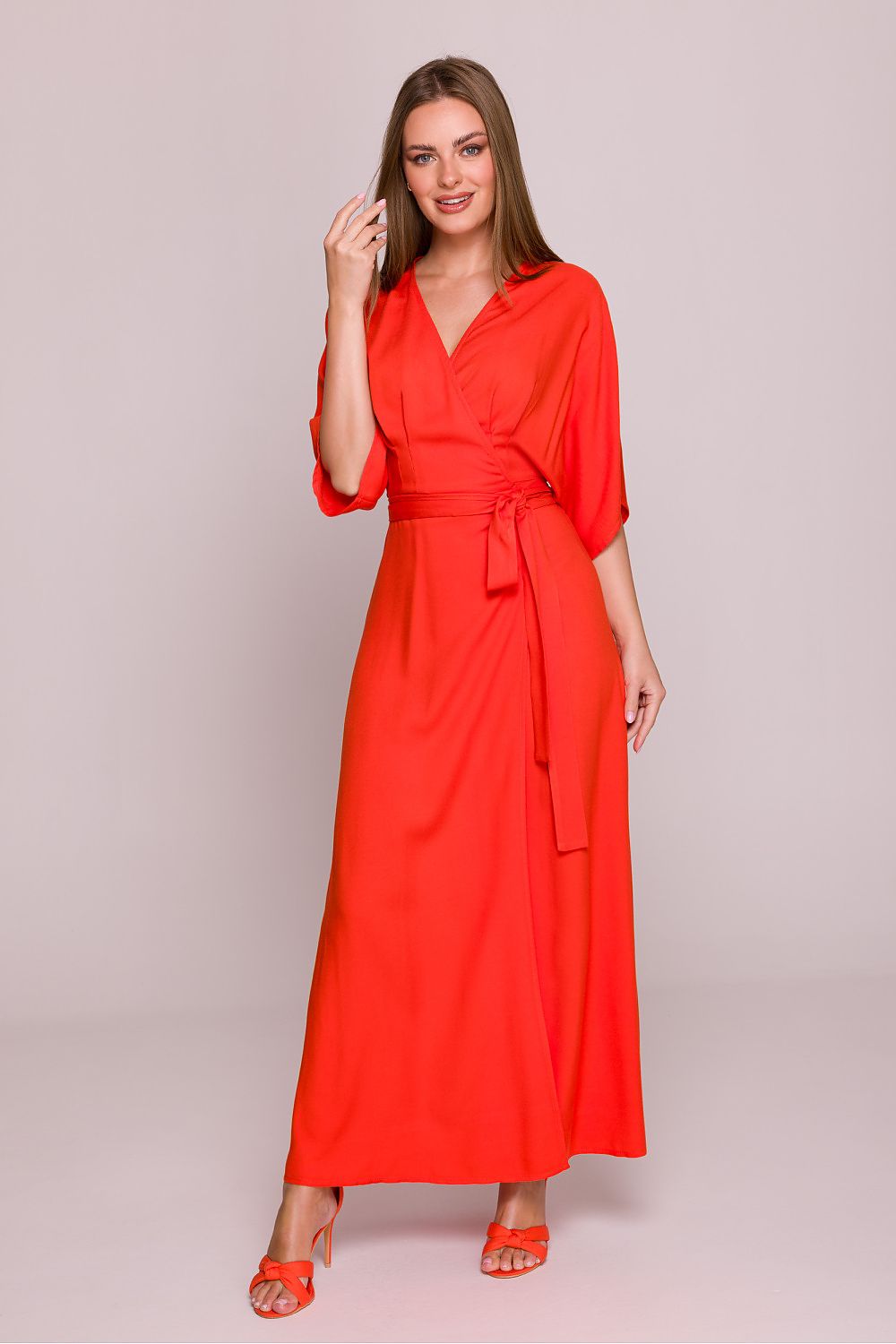 Model wearing the Stylove Satin Finish Daydress, exemplifying comfort and elegance with flared bottom and elbow-length sleeves.