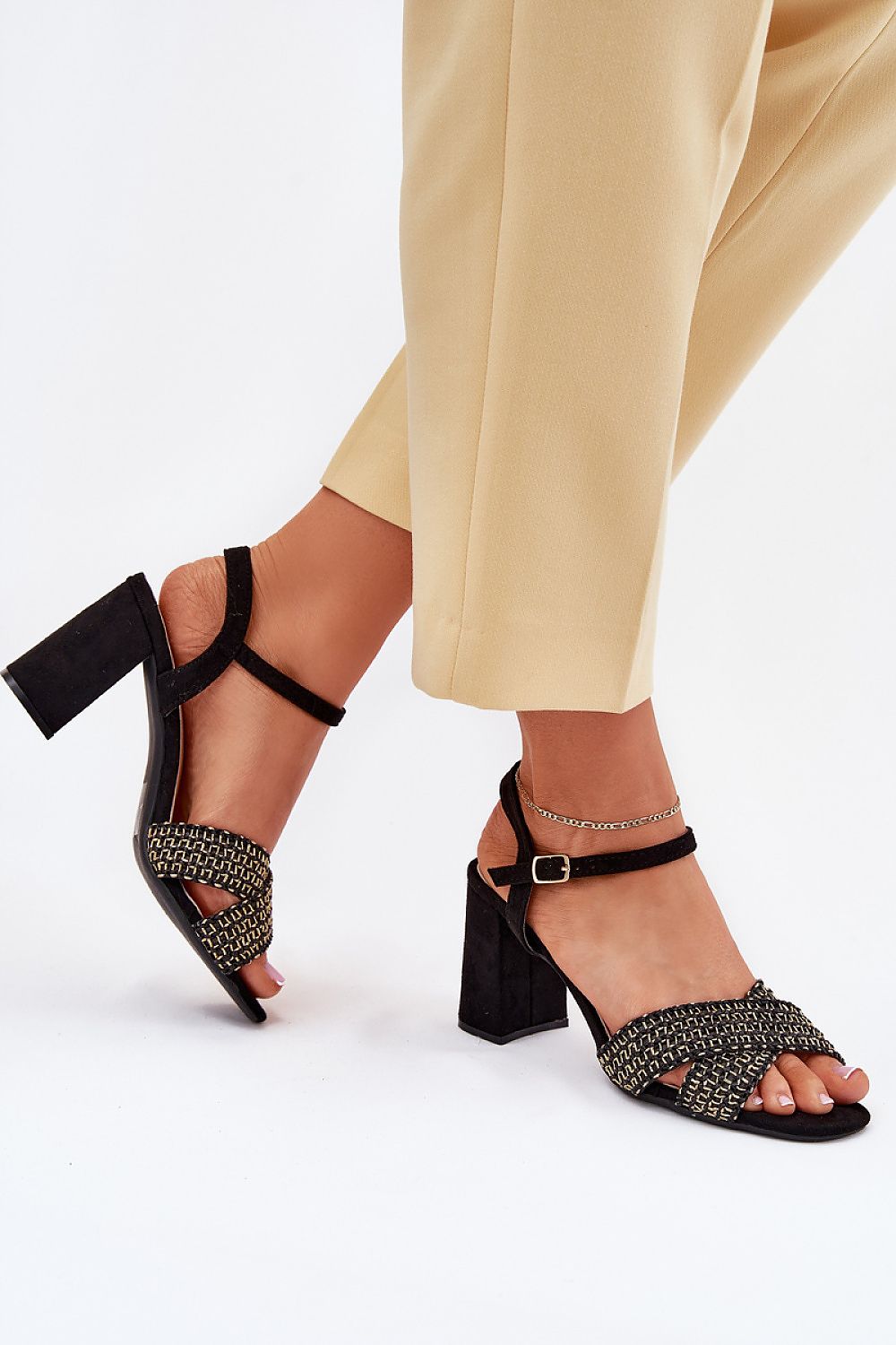 Elegant column heel sandals in eco suede by Step in Style, styled with summer dresses for a luxurious and refined look.
