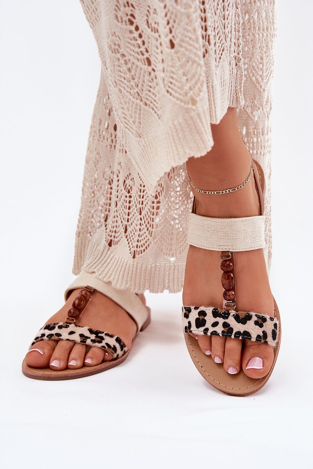 Step in Style sophisticated women's sandals adorned with beads, designed for effortless summer sophistication.