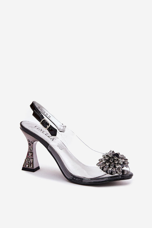 Elegant women's heel sandals by Step in Style featuring crystal decorations and a transparent upper, perfect for special occasions.