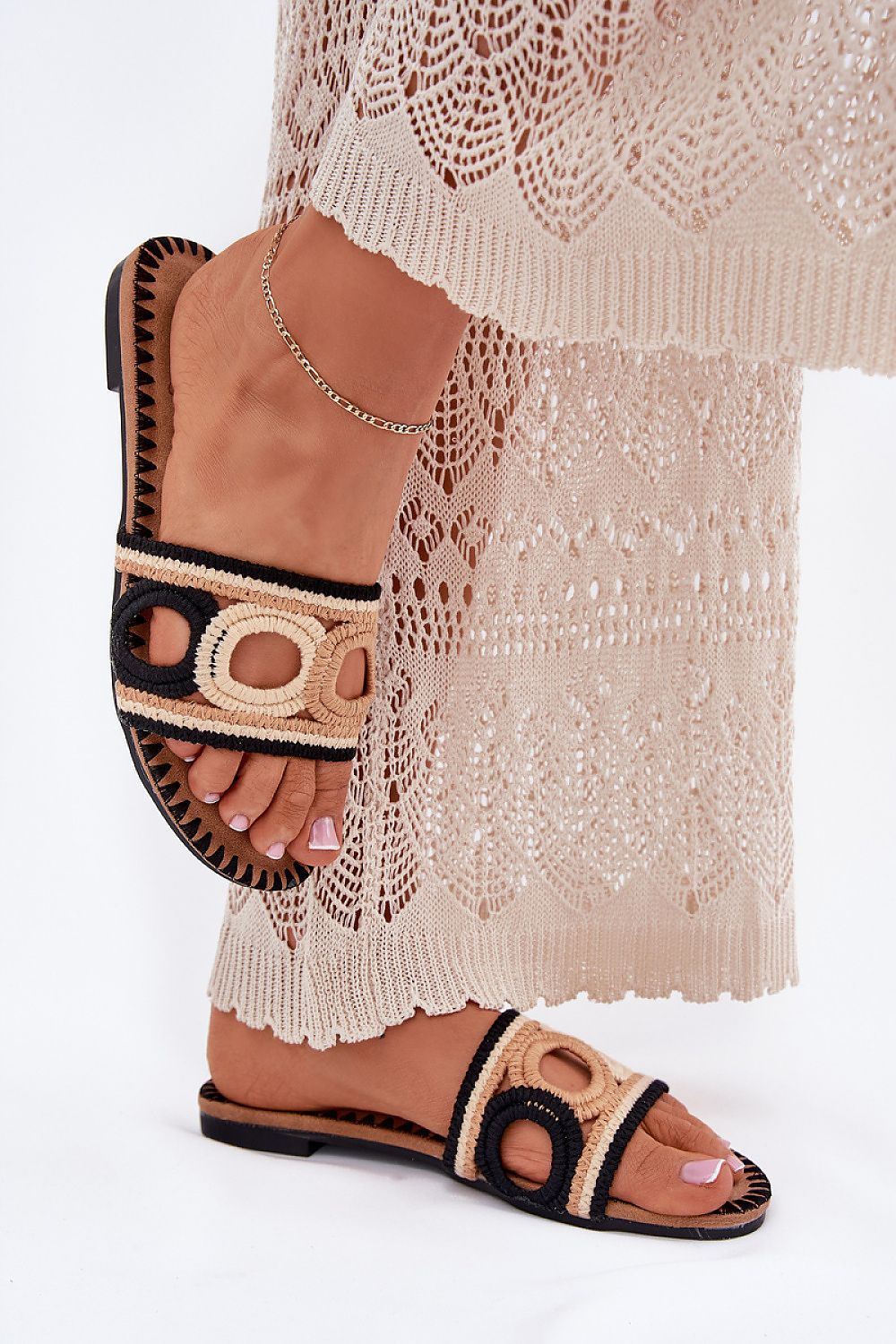 Step in Style luxury crocheted flip-flops for women, showcasing a chic design ideal for warm weather and holiday ensembles.