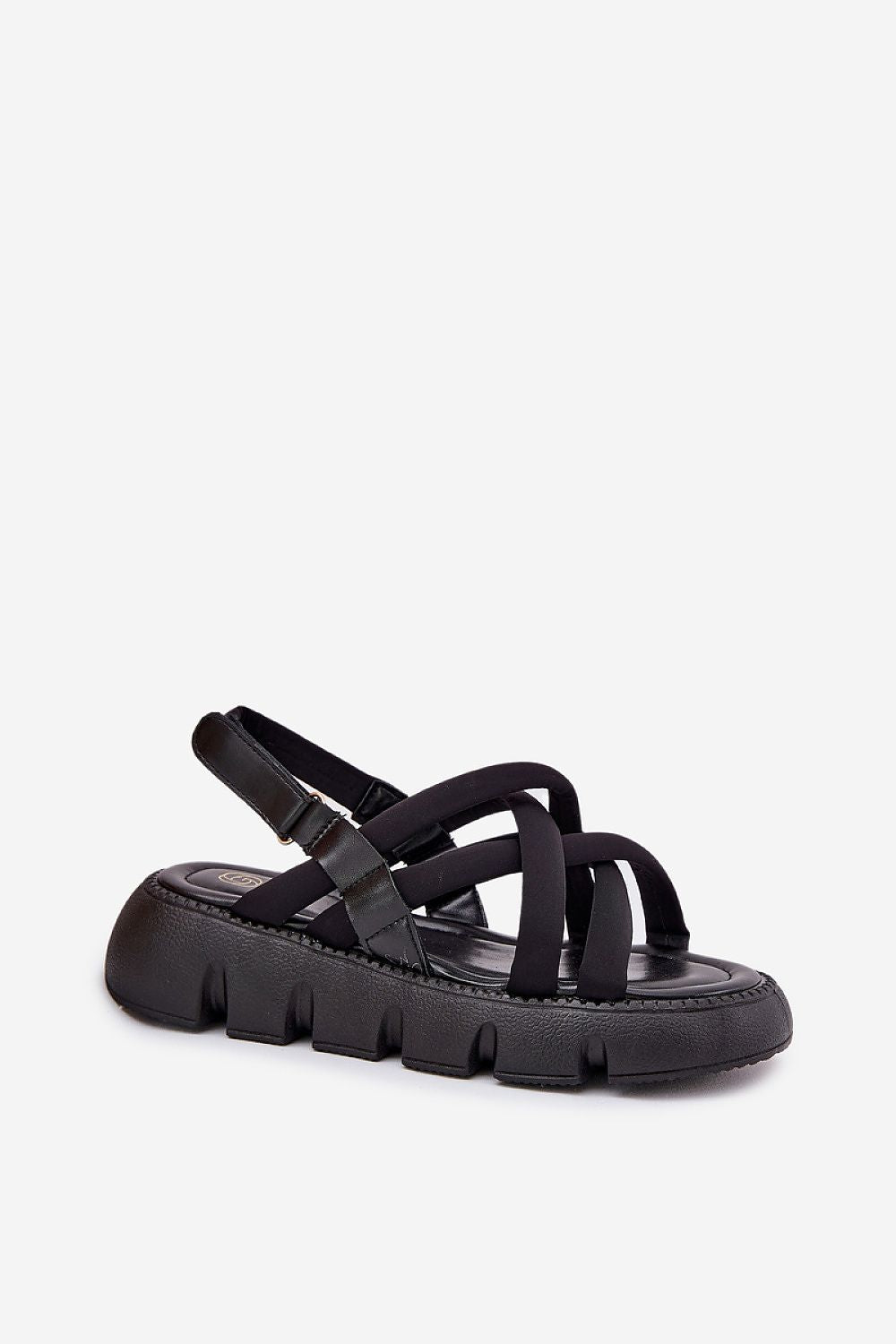 Elegant profile view of Step in Style women's platform sandals with criss-cross straps and comfortable Velcro fastening for ultimate fit.
