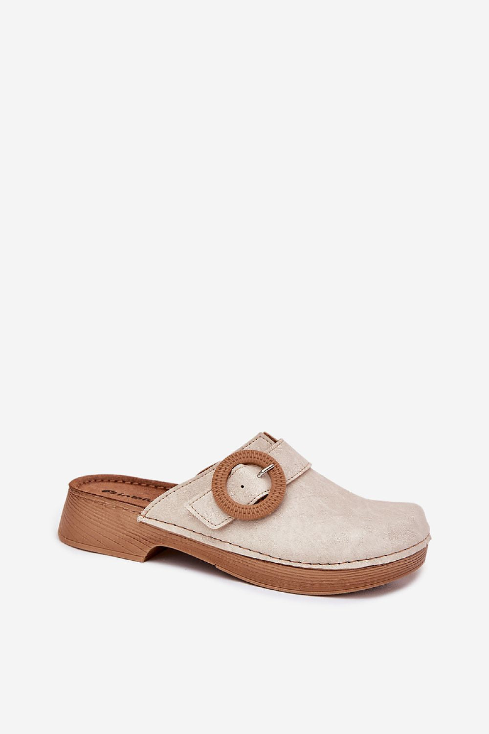 Step in Style comfortable women's flip-flops with anatomical footbed, showcasing decorative buckle and high-quality materials, perfect for fashionable summer wear.