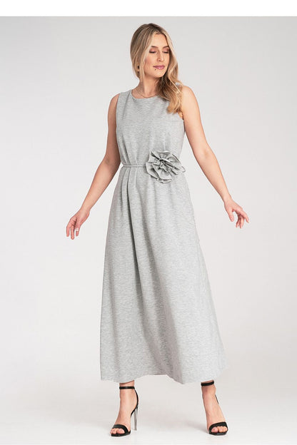 Chic floral accents on Figl's sleeveless maxi dress, showcasing exquisite craftsmanship and elegant silhouette.