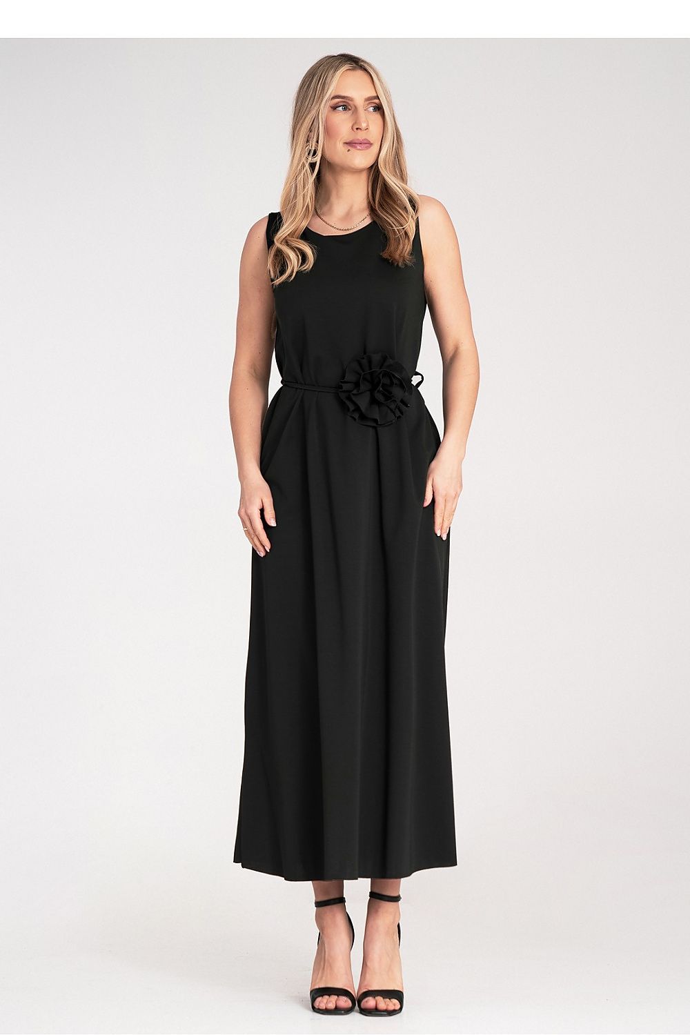 Lush, flared hem of Figl's elegant maxi dress that drapes beautifully, ideal for sophisticated occasions.