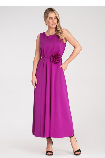 Luxurious Figl maxi dress showcasing a soft draping knit fabric, perfect for summer occasions, in EU size 0 with floral detail at the waist.