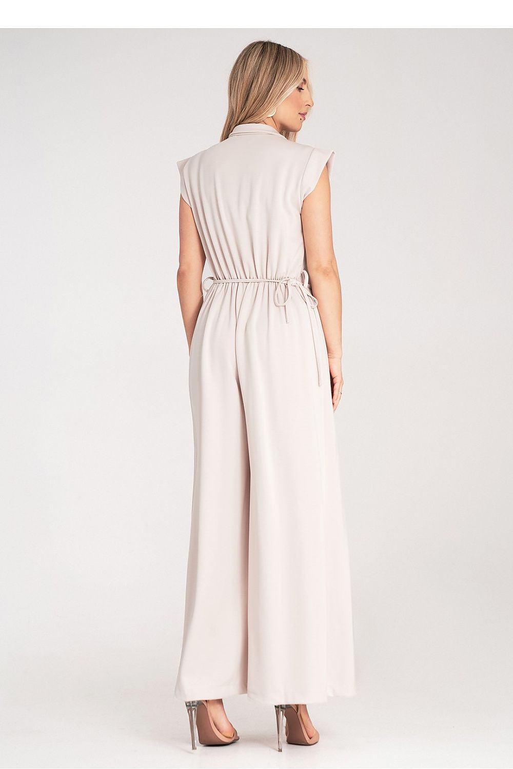 Fashion-forward Figl jumpsuit featuring a collar, belt, and elegant flower detail, tailored for women seeking luxury in size US S/M.