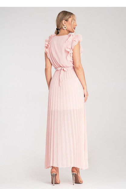 Model wearing the Figl elegant maxi dress with a belt at the waist, highlighting the flowy silhouette and stylish design for a luxurious look.